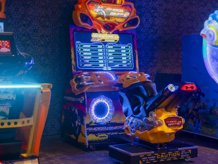 Racing arcade games in the games room at Premier Luxury Mountain Resort, Bansko