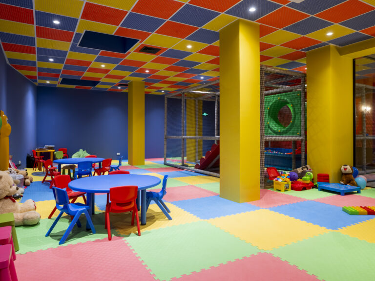 Kids’ club with tables and play equipment at Premier Luxury Mountain Resort, Bansko