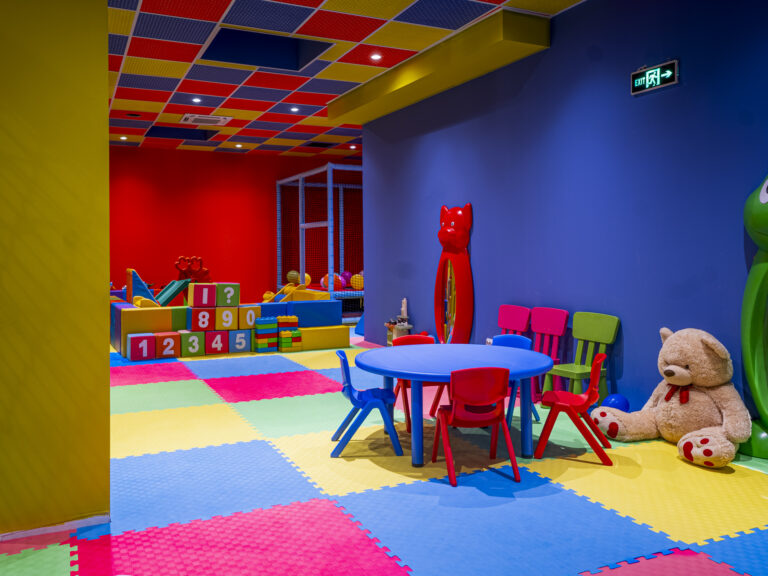 Kids’ club with tables and toys at Premier Luxury Mountain Resort, Bansko