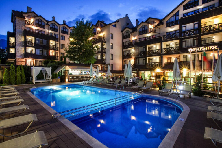 Outdoor pool and hotel at blue hour at Premier Luxury Mountain Resort, Bansko
