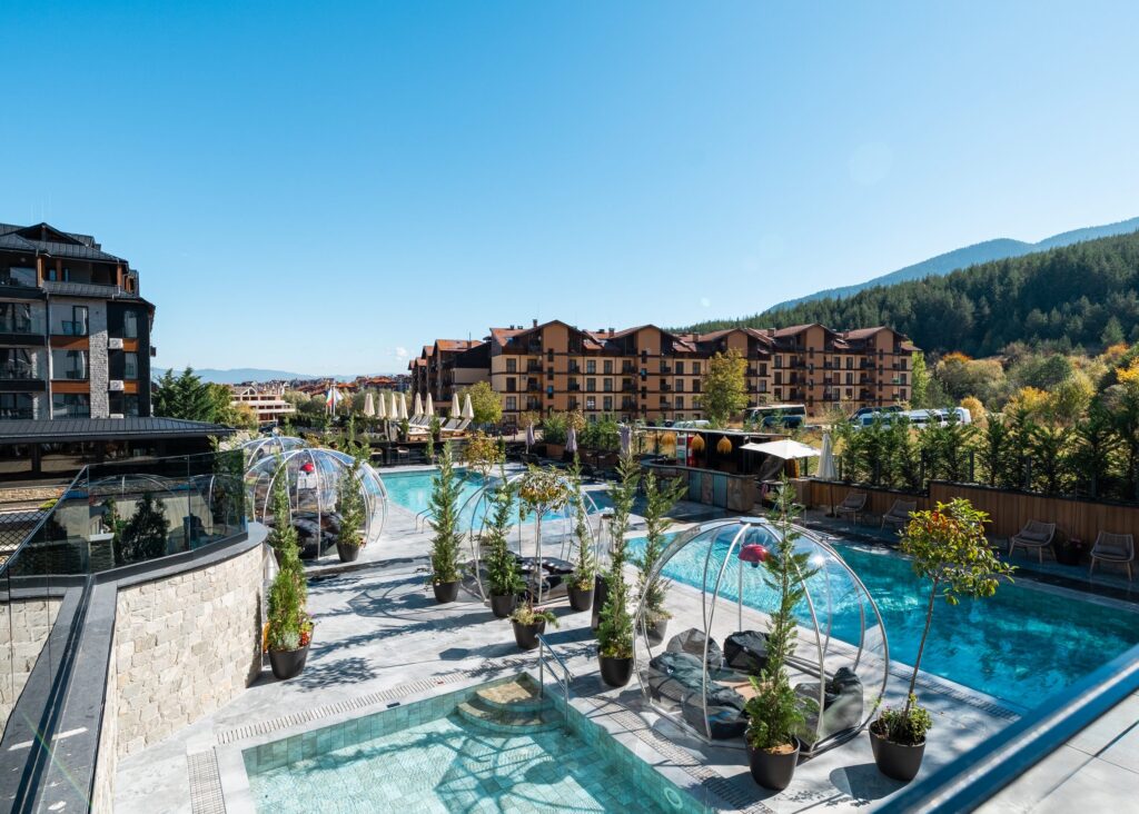 Igloos and relaxation pool on the outdoor terrace with mountain views at Premier Luxury Mountain Resort, Bansko