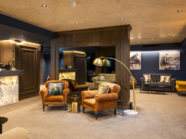 Lounge armchairs near the lobby bar at Premier Luxury Mountain Resort, Bansko